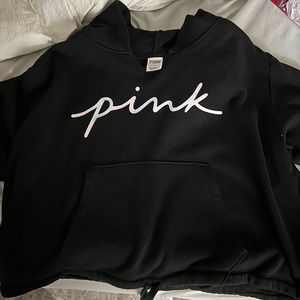 Pink cropped sweatshirt.